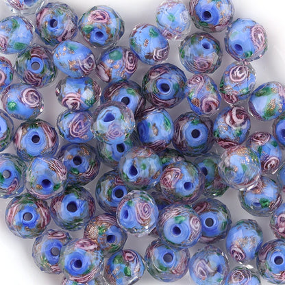 Assorted colorful glass beads on a white background