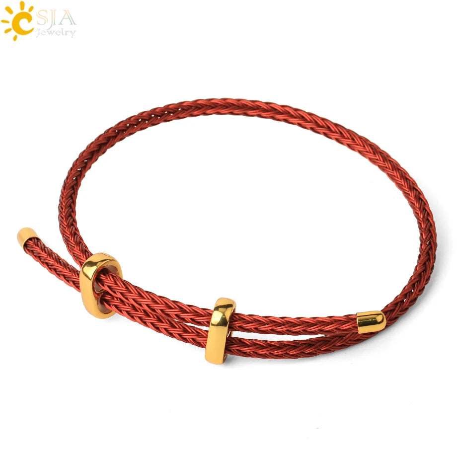 A red braided cord bracelet with polished gold-toned metal sliding rings and end caps, displayed on a clean white background with a SIA jewelry logo in the top-left corner.