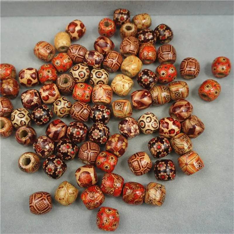 Assorted decorative beads on a gray surface