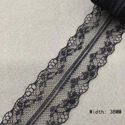 Black lace trim on a light gray background with width measurement.