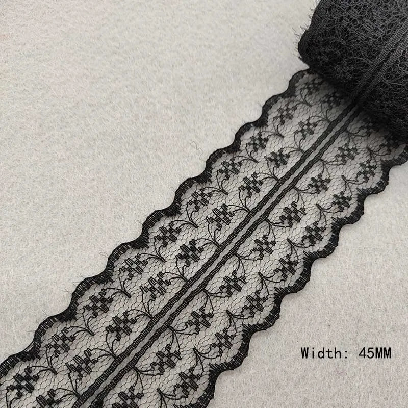 Black lace ribbon on a light gray background