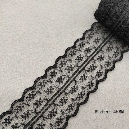 Black lace ribbon on a light gray background
