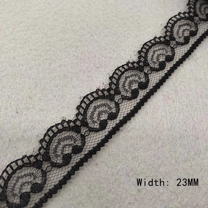 Black lace trim on a light gray background with width measurement '23MM'.