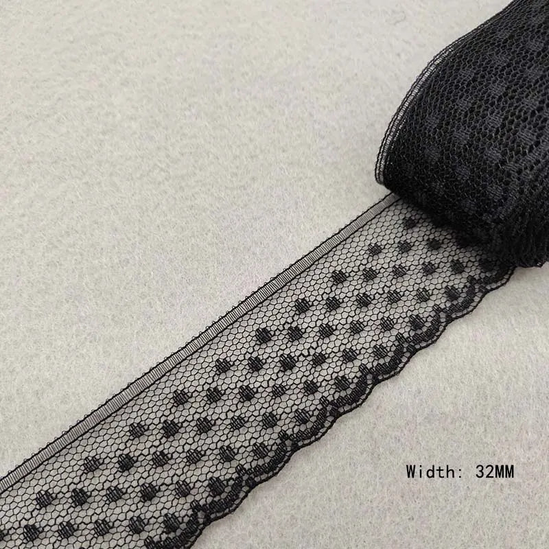 Black lace ribbon on a light gray background