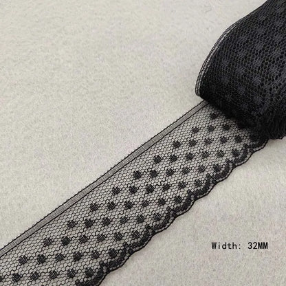 Black lace ribbon on a light gray background