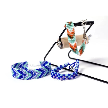 Set of beaded bracelets and earrings on a white background