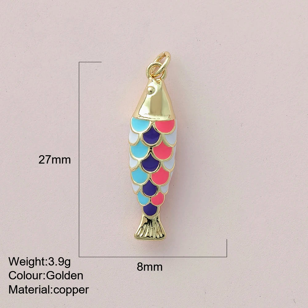 Gold fish-shaped pendant with colorful scales on a light pink background