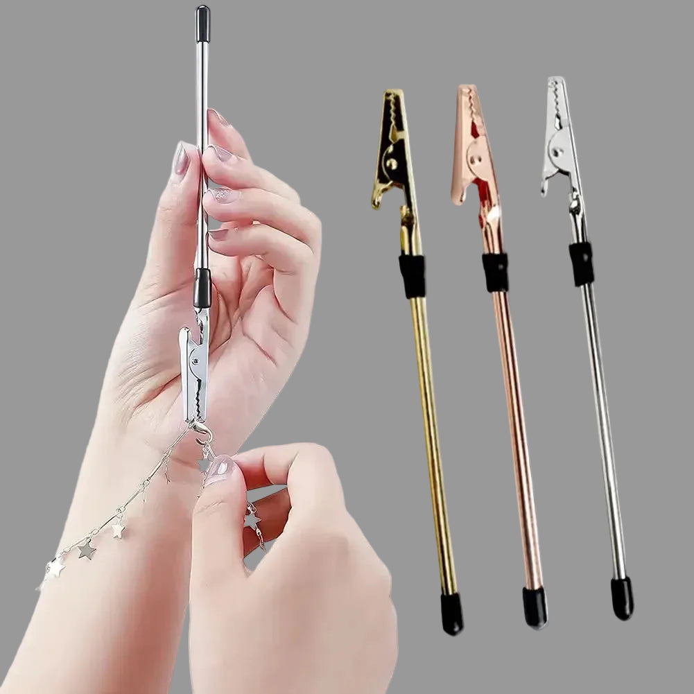 Jewelry handles with gold, rose gold, and silver finishes held by a hand.