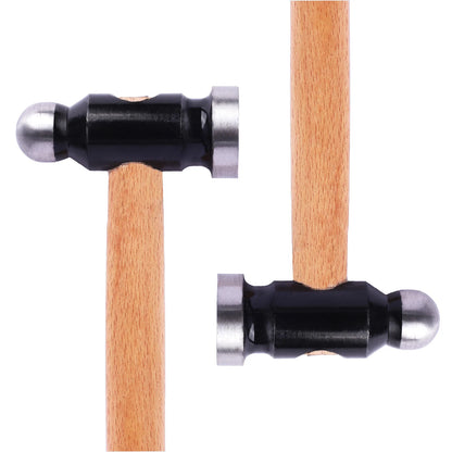 Two wooden jewelry mallets with metal heads on a white background