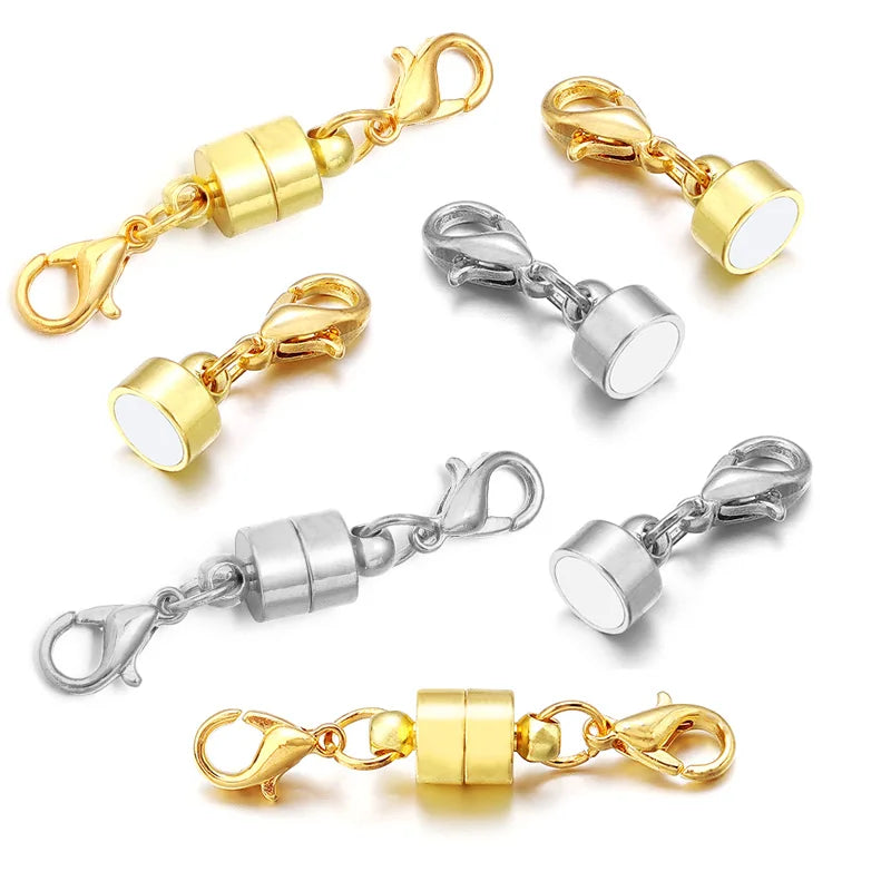 Six gold and silver magnetic ring clasp keychains arranged on a clean white background.