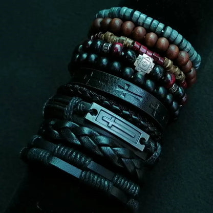 Stack of various bracelets on a dark background