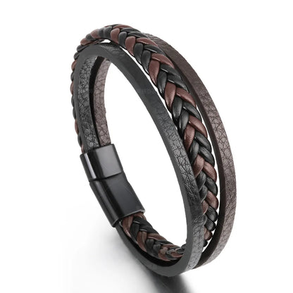 Bracelet with braided leather straps on a white background