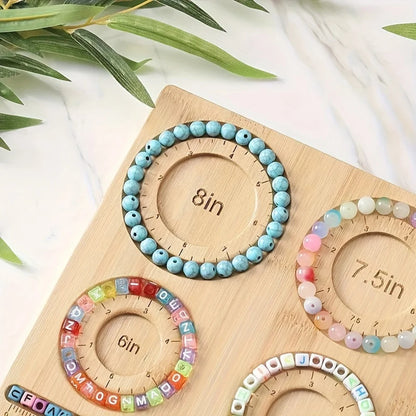 Wooden measuring board with circular cutouts for measuring bracelets on a light beadboard.