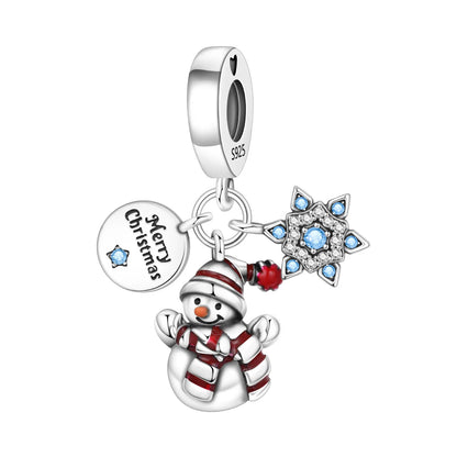 Silver charm with snowman, star, and 'Merry Christmas' tag on a white background