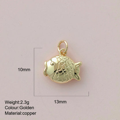 Gold fish pendant with measurements and material details on a light pink background