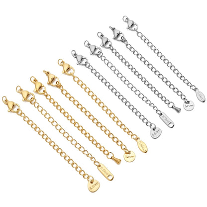 Set of gold and silver chain bracelets with attached charms on a white background
