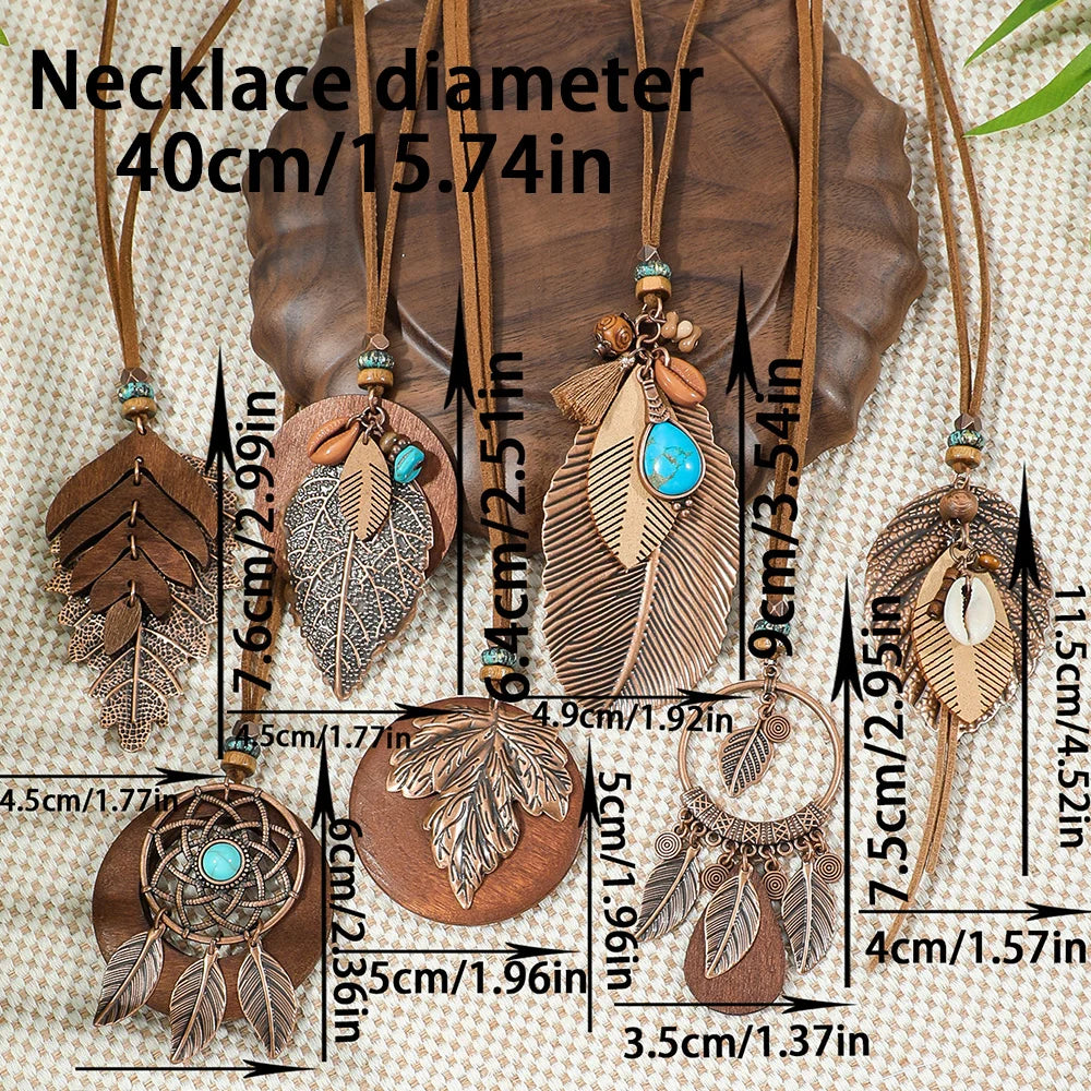 Feather-shaped necklaces with measurements on a textured background