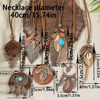 Feather-shaped necklaces with measurements on a textured background