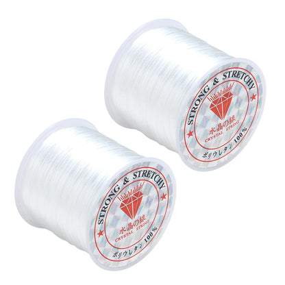 Two spools of strong and stretchy thread with labels on a white background