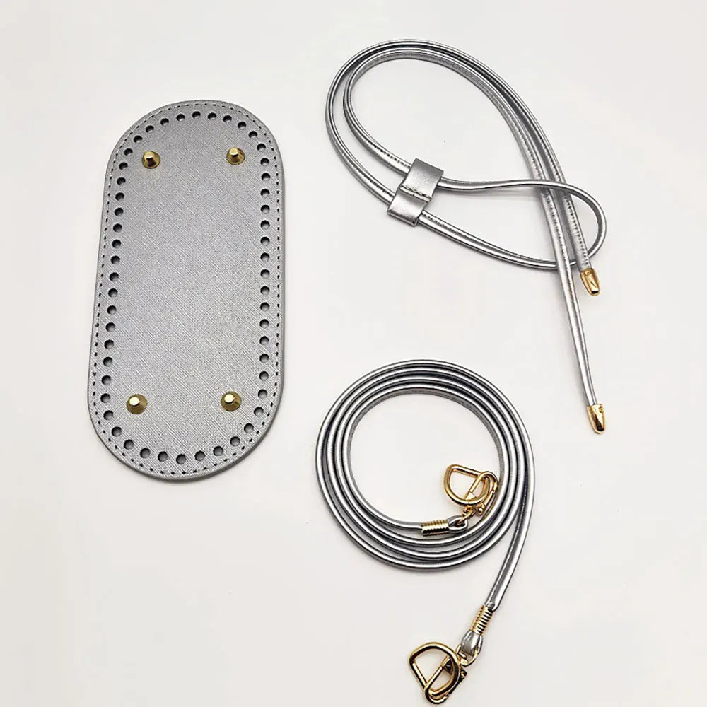 Gray leather patch with gold hardware on a white background