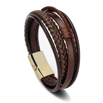 Brown braided leather bracelet with a gold clasp on a white background