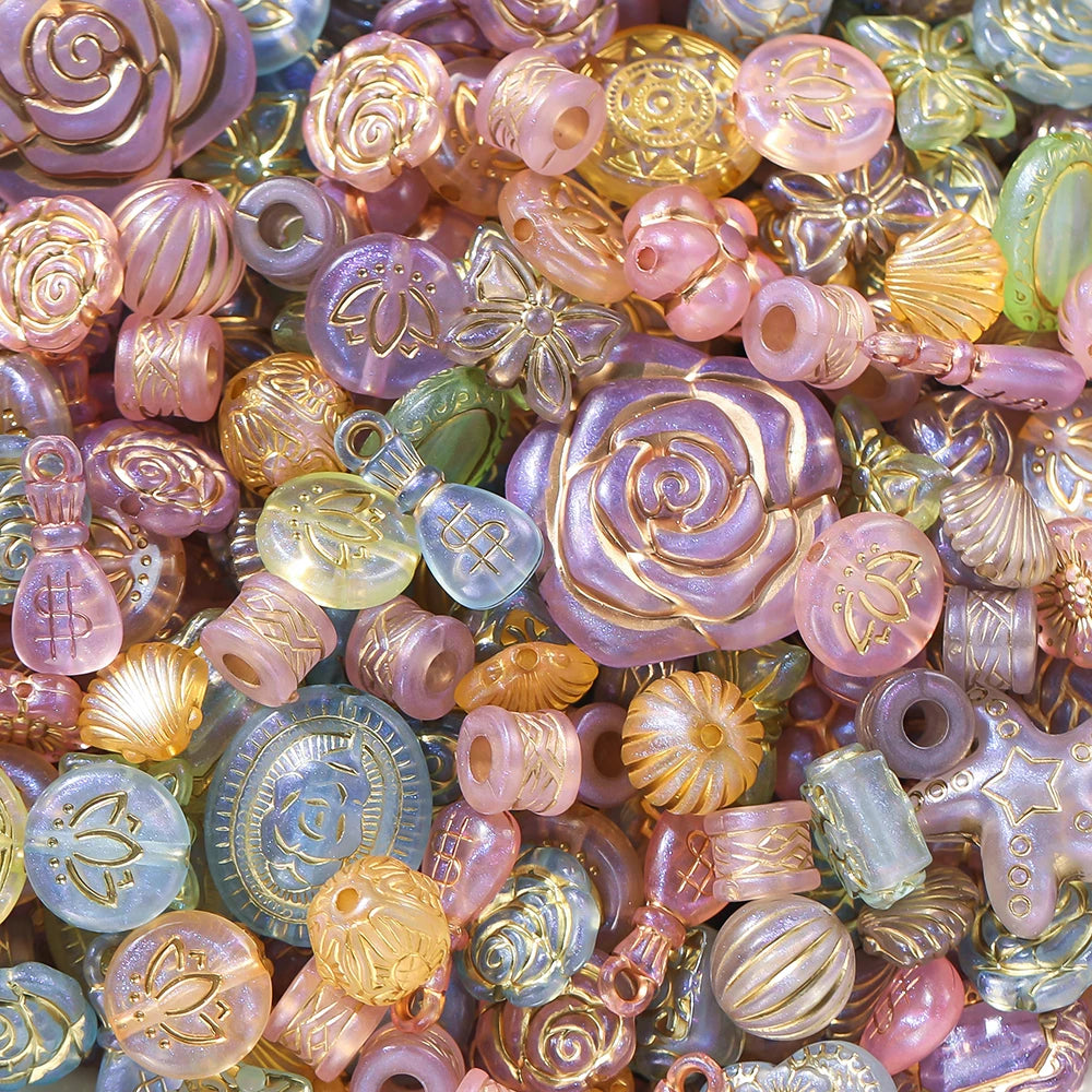 Assorted colorful beads with floral and decorative designs.