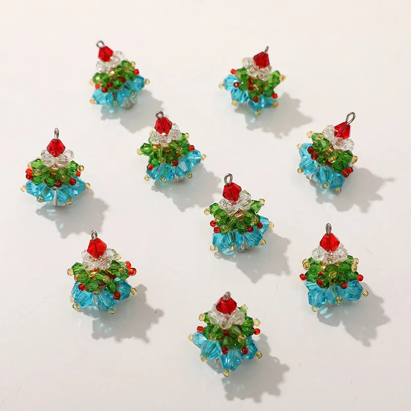 Colorful beaded Christmas tree charms on a white background