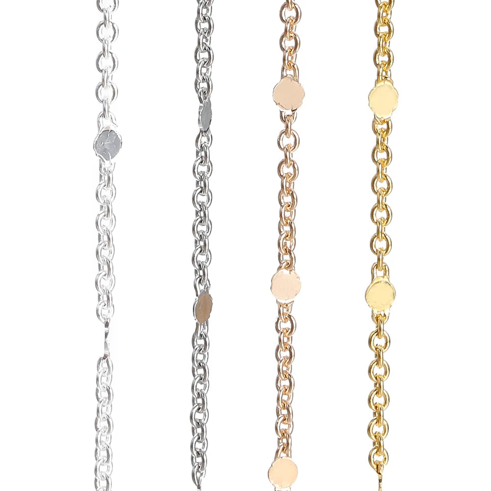 Three gold necklaces for jewelry making of different designs on a white background