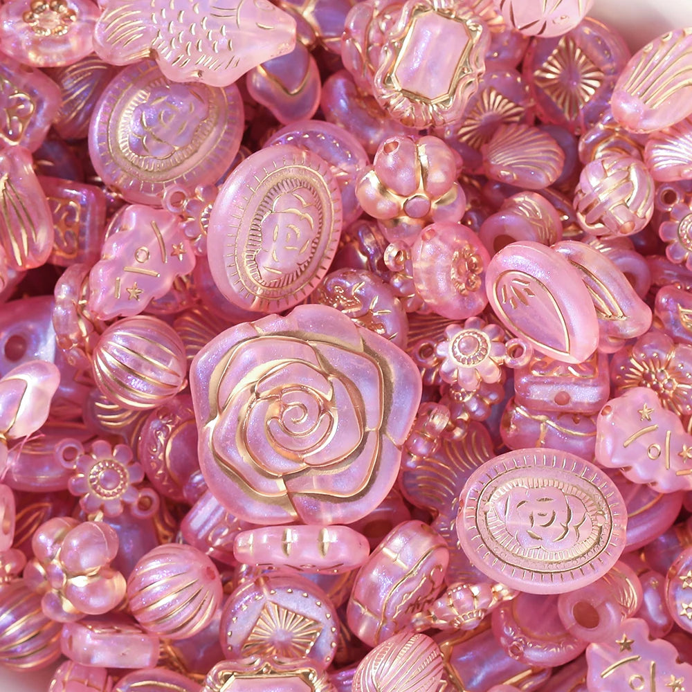 Close-up of pink and gold decorative beads