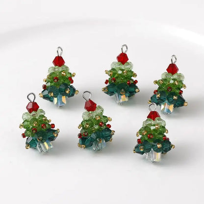 Set of beaded Christmas tree ornaments on a white background