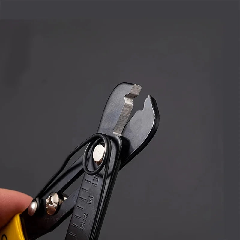 Multi-tool with various functions including jewelry making held by a hand against a dark background