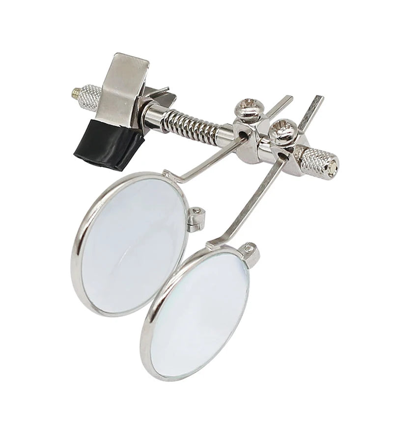 Pair of silver eyeglass frames with white lenses on a white background