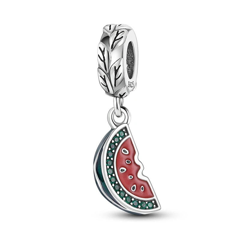 Silver charm with a watermelon slice design on a white background