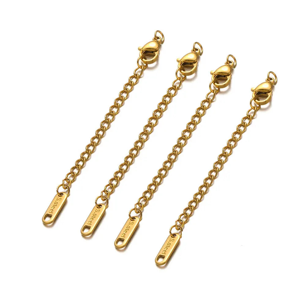 Gold chain extensions on a white background
