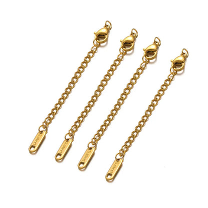 Gold chain extensions on a white background