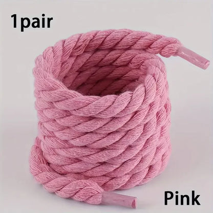 Pink shoelace with a white background
