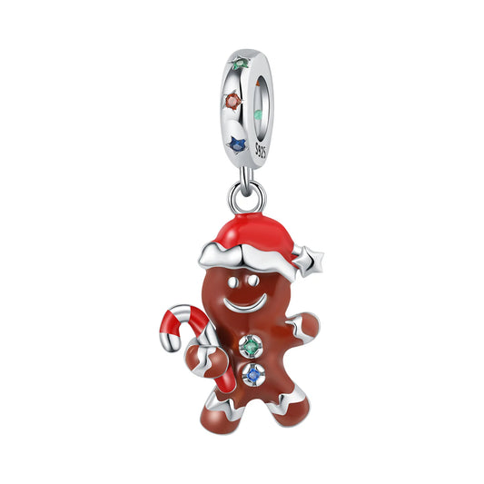 A silver-toned Christmas gingerbread man charm with red and white enamel details, holding a candy cane and decorated with small colored gemstones, shown on a plain white background.
