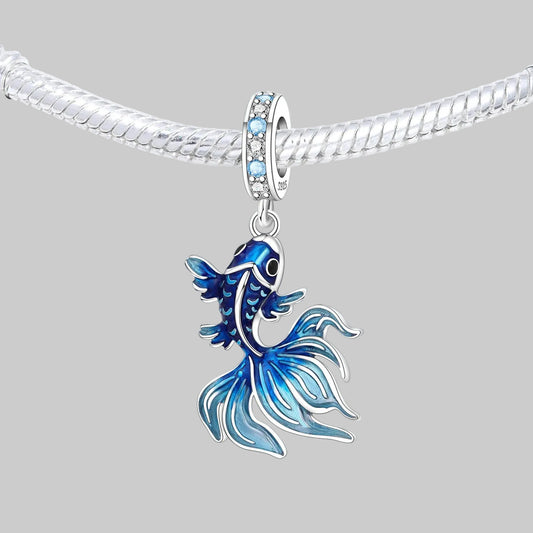 Blue fish-shaped pendant on a silver chain against a white background