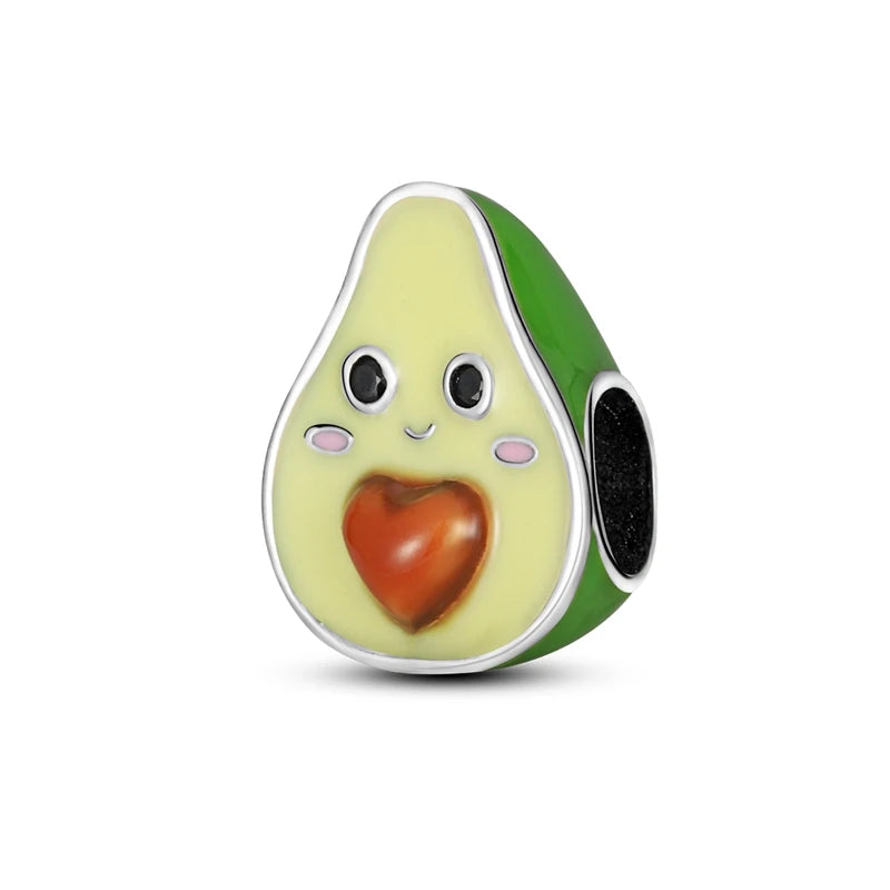 Avocado-shaped charm with a smiling face and red heart on a white background