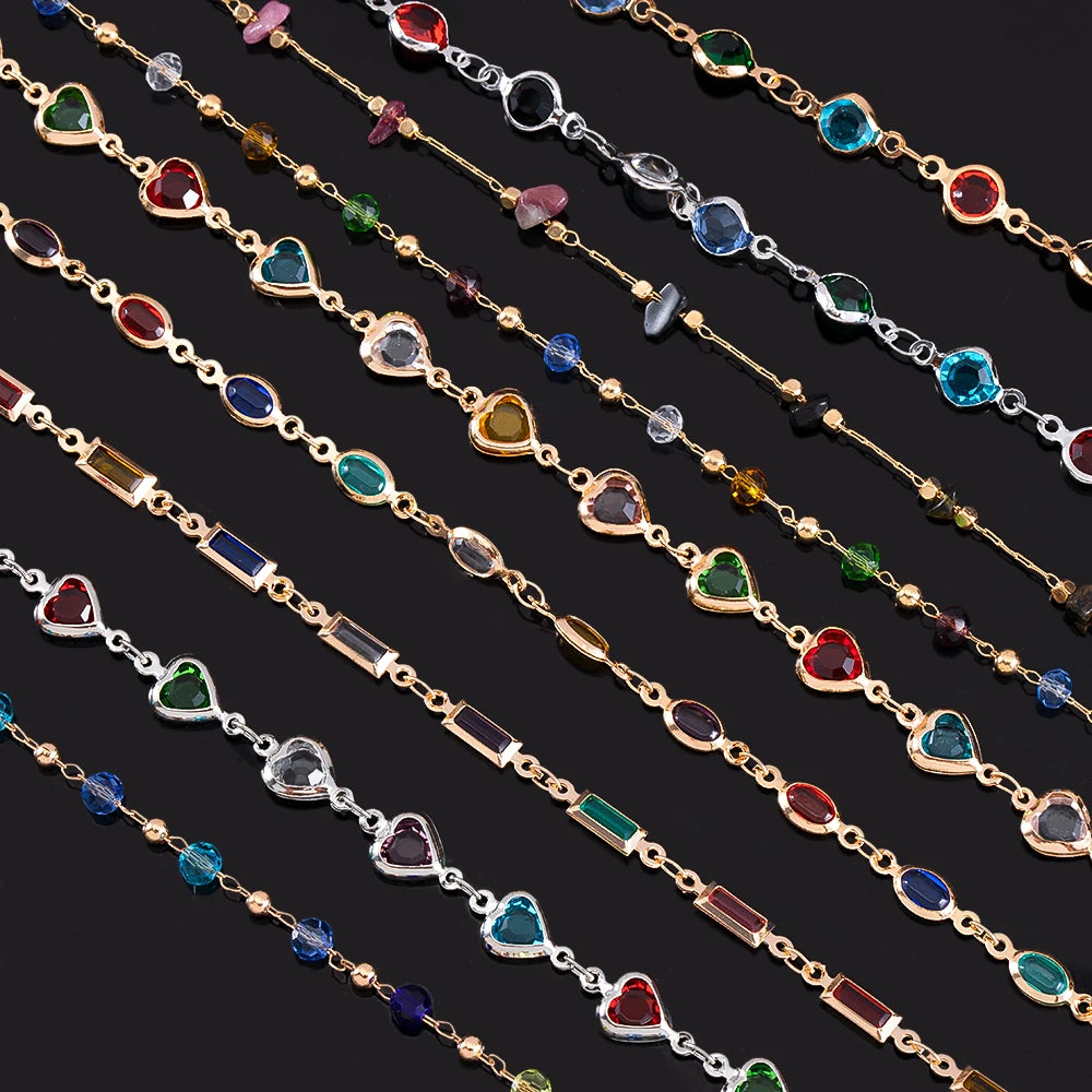 Multicolored gemstone necklaces on a black background