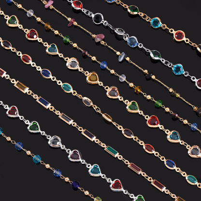 Multicolored gemstone necklaces on a black background