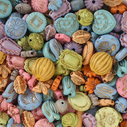Assorted colorful decorative beads with intricate designs.