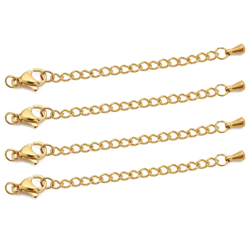 Gold chains with clasp ends on a white background