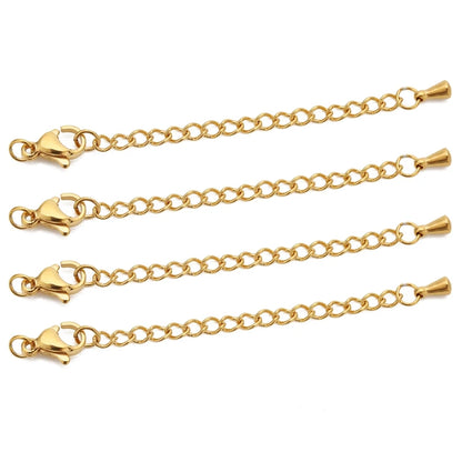 Gold chains with clasp ends on a white background
