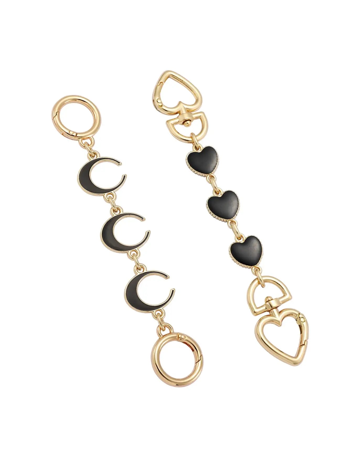 Gold and black heart, moon, and bag extender on a white background