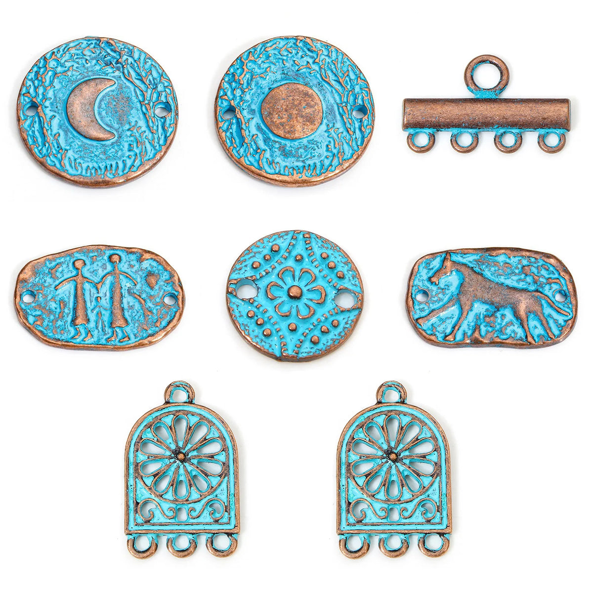 Seven decorative metal jewelry findings with distressed turquoise and bronze finishes, including crescent moon, sun, bar, floral medallion, and scroll motifs on a white background.