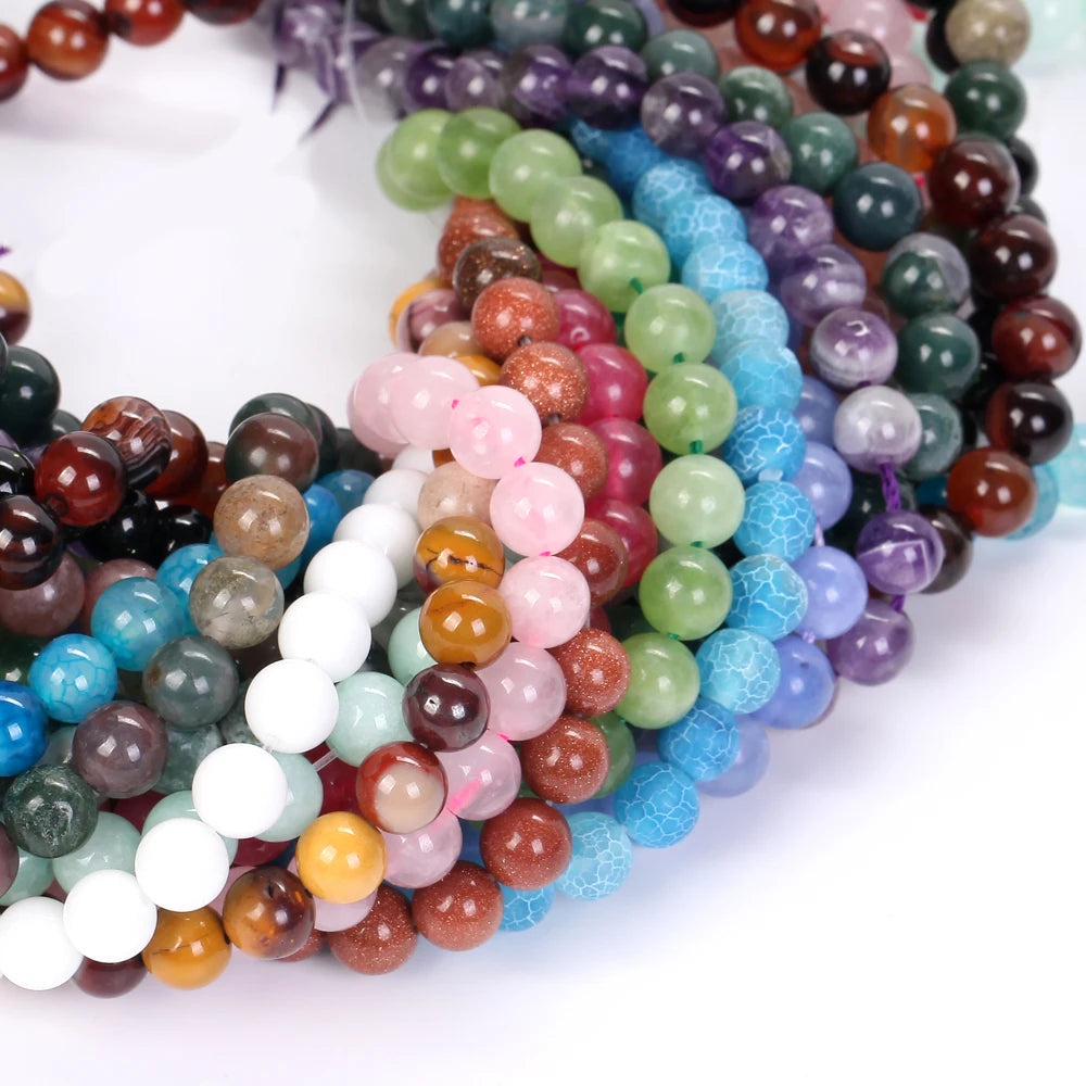 Colorful beaded bracelets on a white background