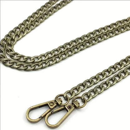 Brass chain with clasp on a white background