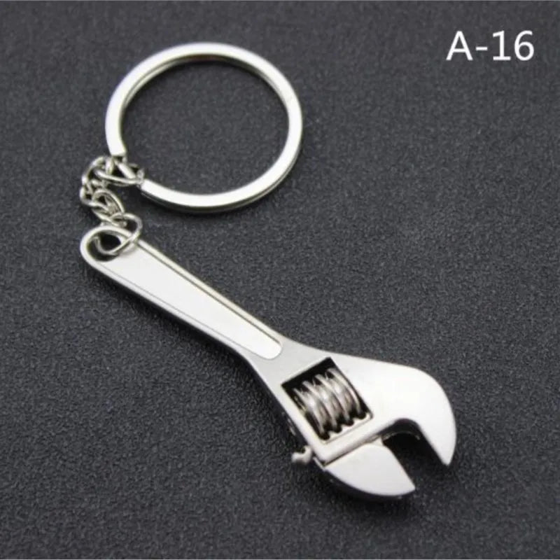 Wrench-shaped keychain on a dark background