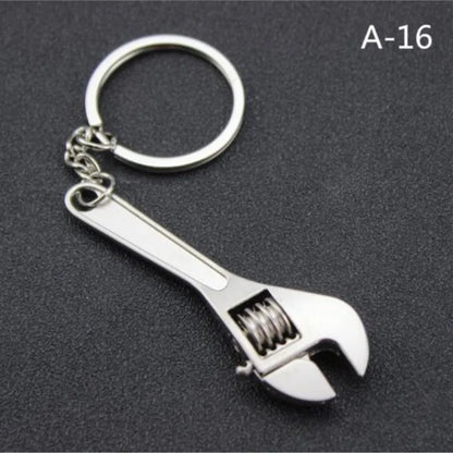Wrench-shaped keychain on a dark background